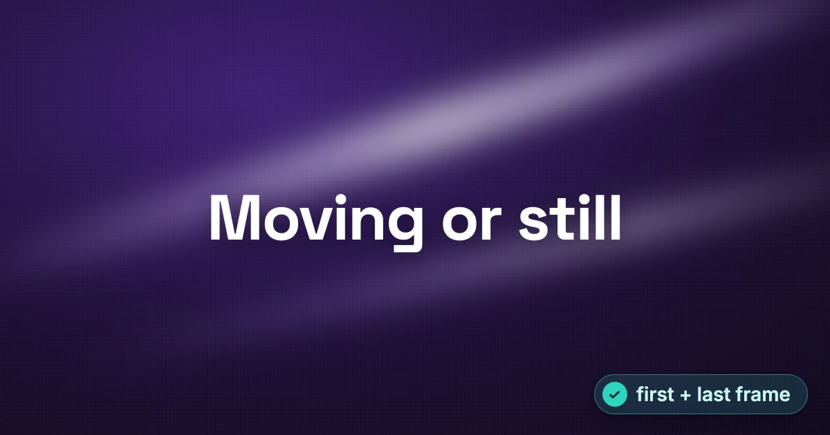The clean composed frame: "Moving or still" centered and sharp in heavy white type over crisp streaks of purple and white light.